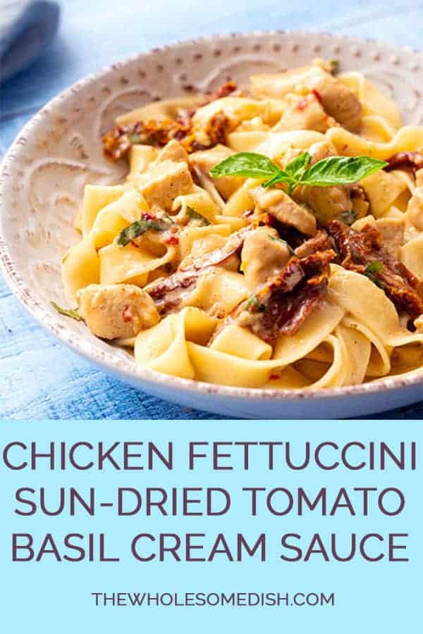 Sun-Dried Tomato Cream Sauce over noodles and chicken in a bowl