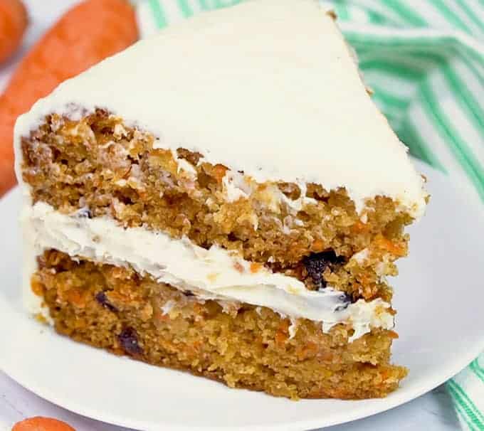 Slice of carrot cake with cream cheese frosting