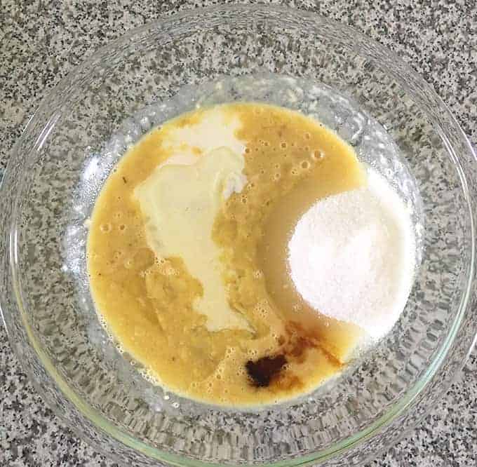 Buttermilk, oil, sugar, vanilla, eggs, and bananas in a bowl