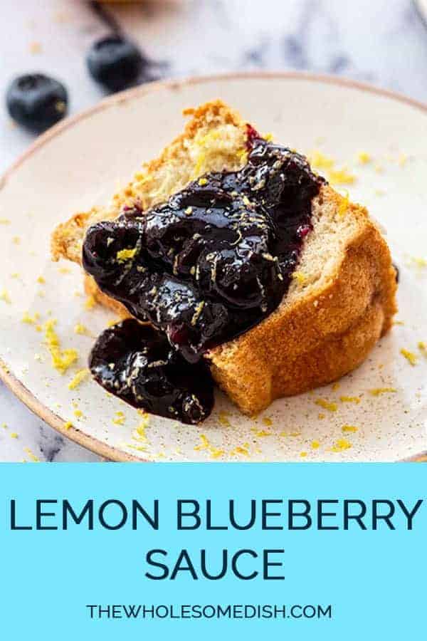 Lemon Blueberry Sauce Recipe poured over angel food cake on a plate