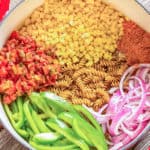 Uncooked ingredients for one pot wonder southwest pasta in a pot