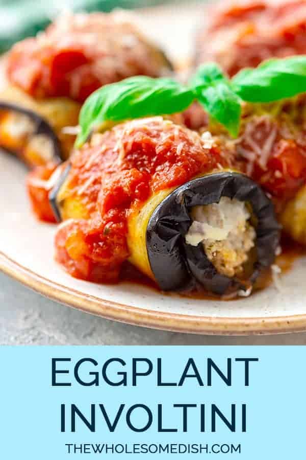 Eggplant involtini stuffed with ricotta and topped with spaghetti sauce on a plate