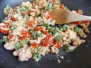 tomatoes basil and parmesan in a sautée pan