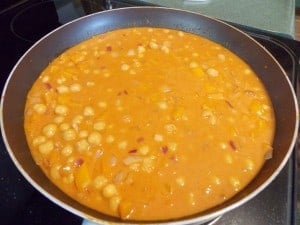 skillet full of coconut curry garbanzo beans