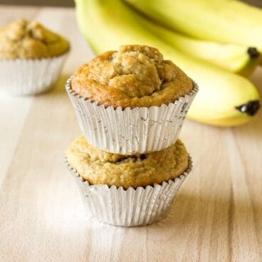 2 Banana Peanut Butter Oat Muffins stacked on top of each other