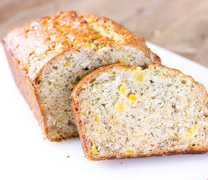 sliced Tropical Banana Bread on a cutting board