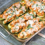 baking dish full of cooked Chicken Parmesan Zucchini Boats