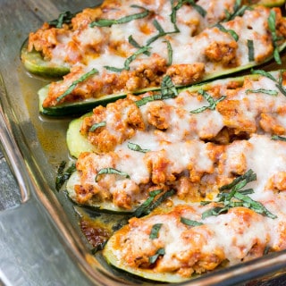 baking dish full of cooked Chicken Parmesan Zucchini Boats