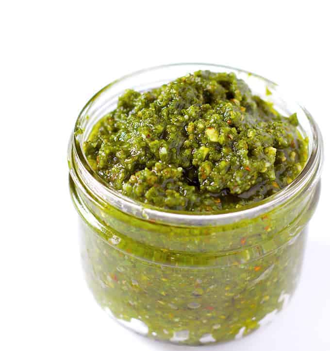 glass jar full of Basil Pesto with Almonds