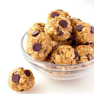 bowl full of peanut butter oat balls with chocolate chips
