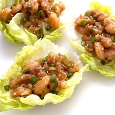 3 Asian shrimp lettuce wraps with hoisin sauce and water chestnuts