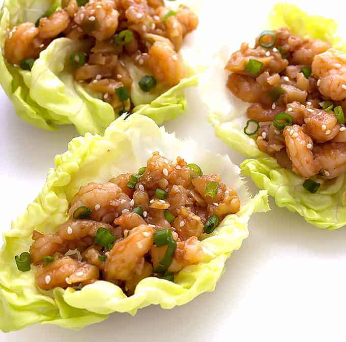 3 Hoisin Shrimp Lettuce Wraps on a white board