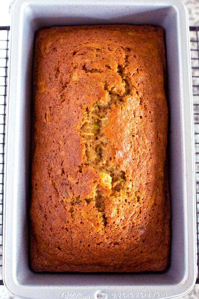 Loaf pan of baked easy zucchini bread recipe