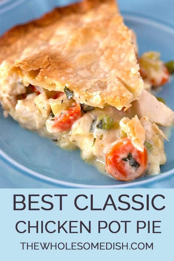 Slice of the best chicken pot pie recipe with creamy filling inside pie crust