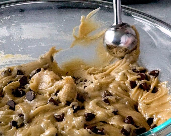 1 ½ tablespoon scoop getting chocolate chip cookie dough out of a bowl