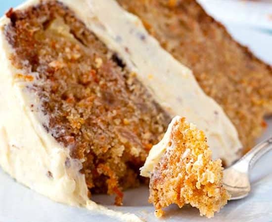 Slice of the best carrot cake on a plate