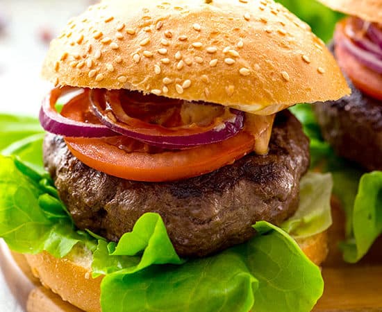The best classic burger recipe on a bun with traditional hamburger toppings