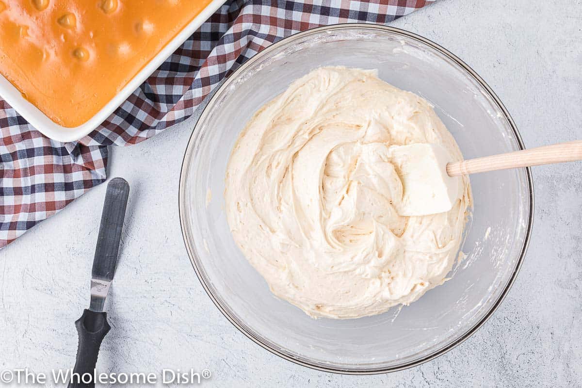 Brown sugar cream cheese frosting in a mixing bowl.
