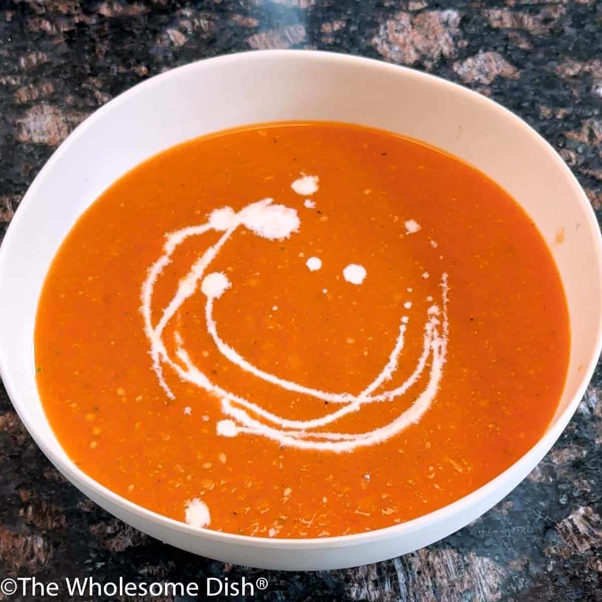 Bowl full of homemade tomato soup.
