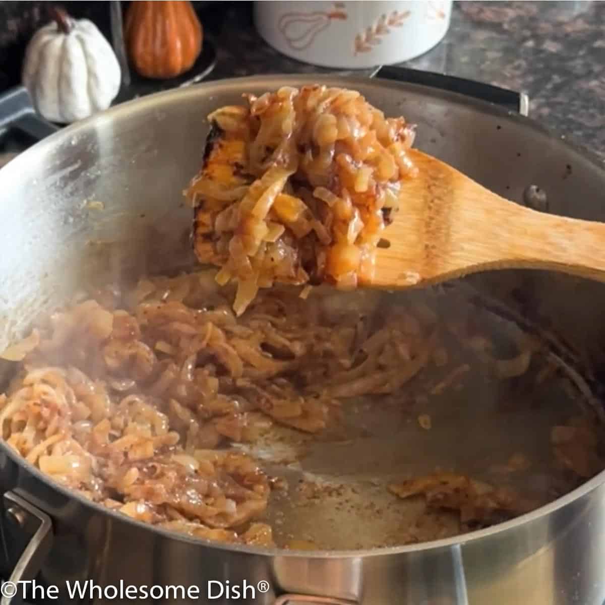 Caramelized onions in a soup pot.