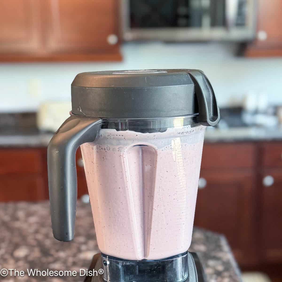 Blender full of blended drinkable yogurt.